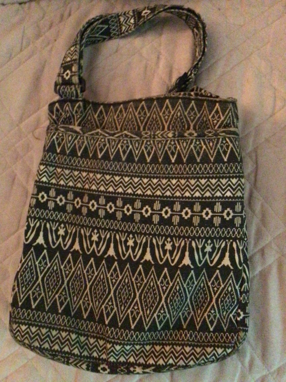 Black and White gently used canvas geometrical pattern Kavu crossbody bag.